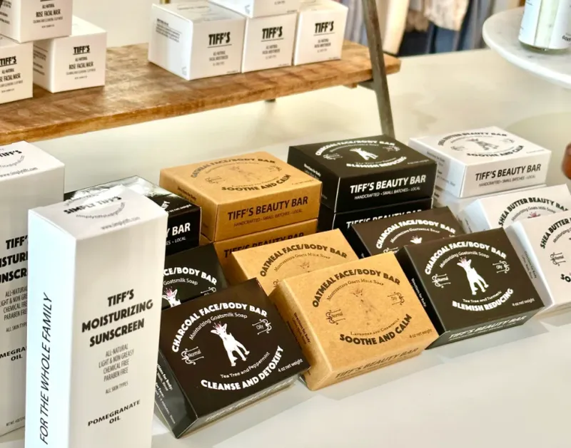 Simply Tiff's sunscreen and bar soap on display